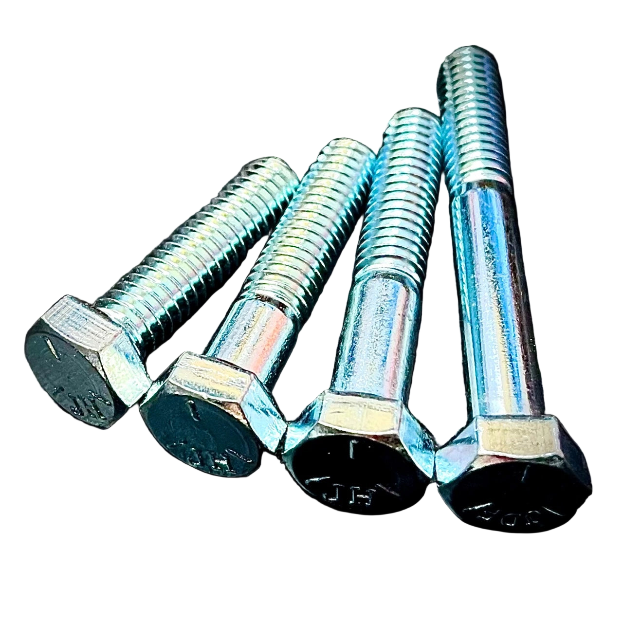 A set of metallic hex bolts with a hexagon head, zinc plated, laid out on a black surface. Fixaball LTD UK white